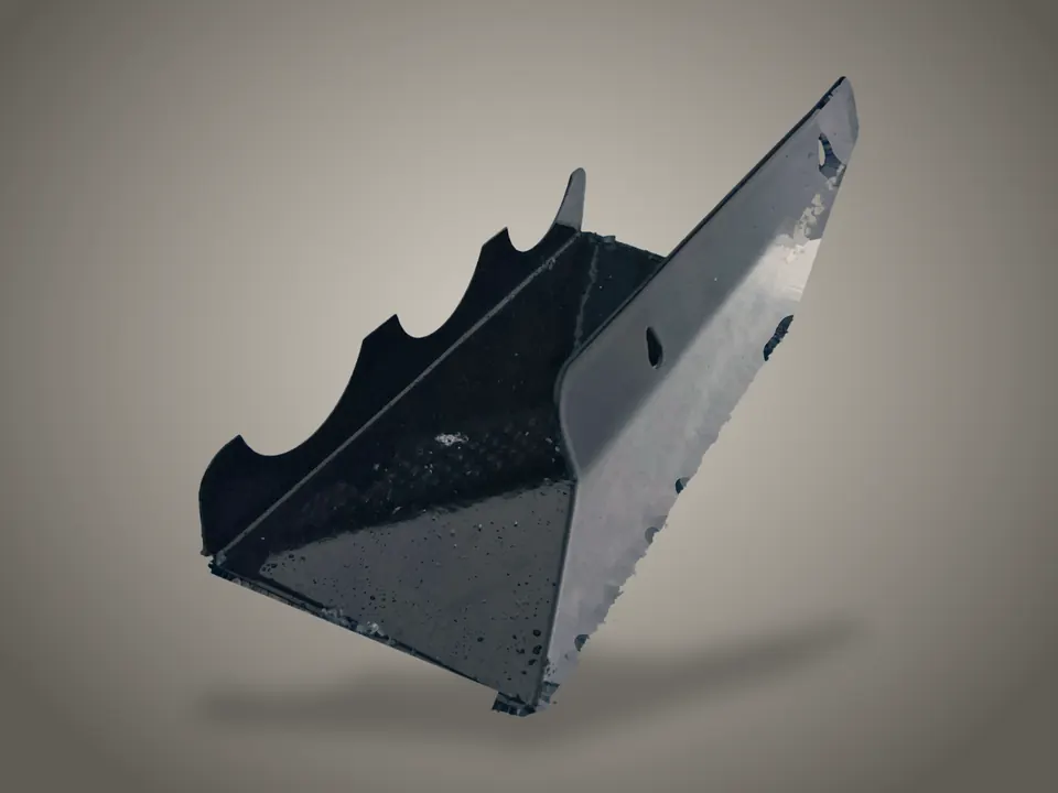 A black Triad seen end-on, showing the folded L and the returning lip.